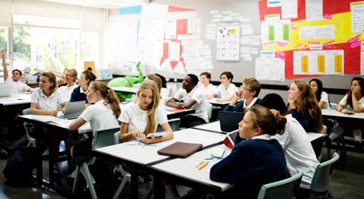 Photo of students sitting in a classroom